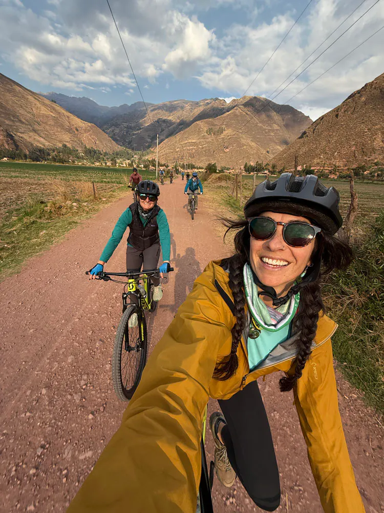 Two explorers on bikes wearing Oboz footwear