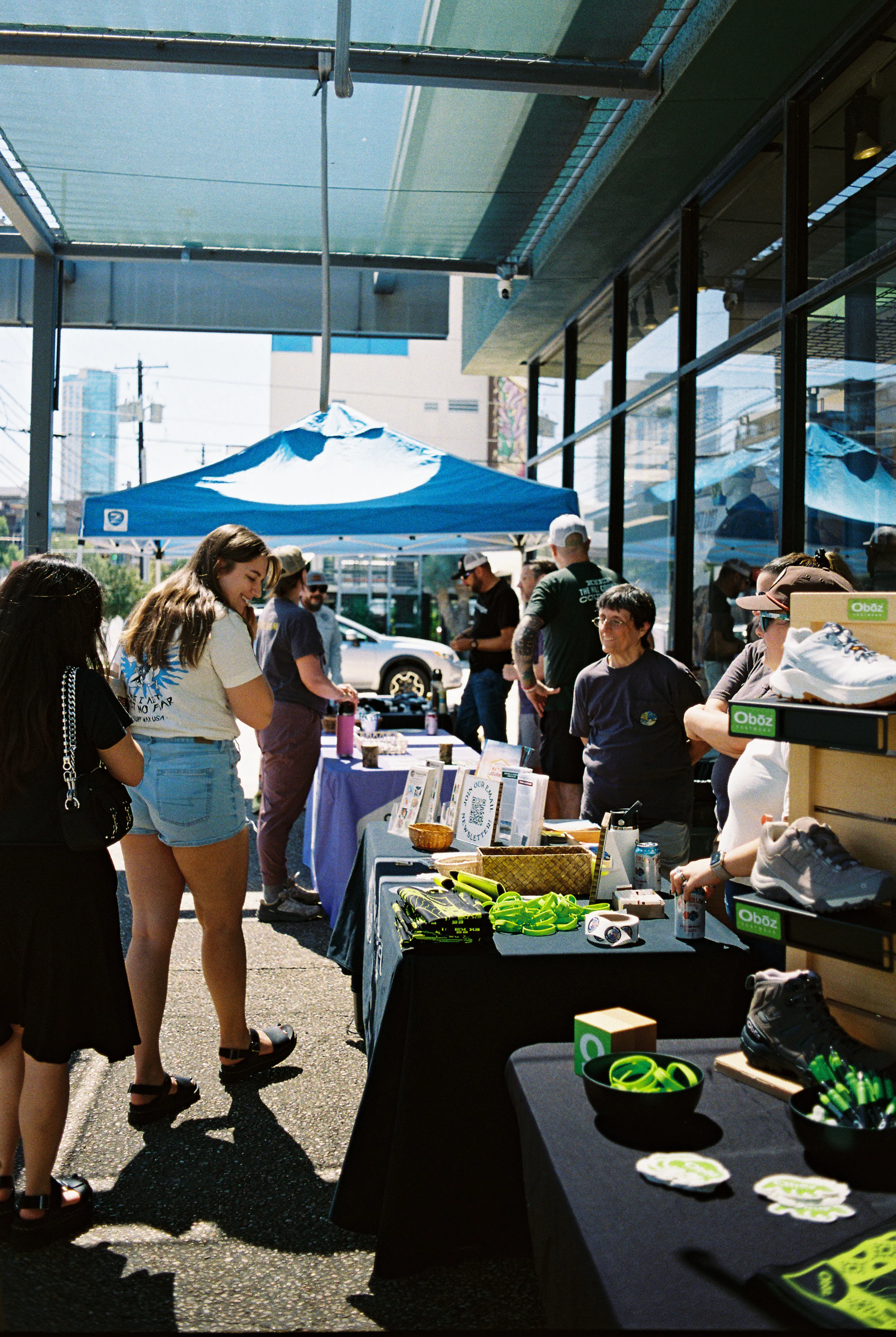 Shoppers browse Oboz hiking shoes