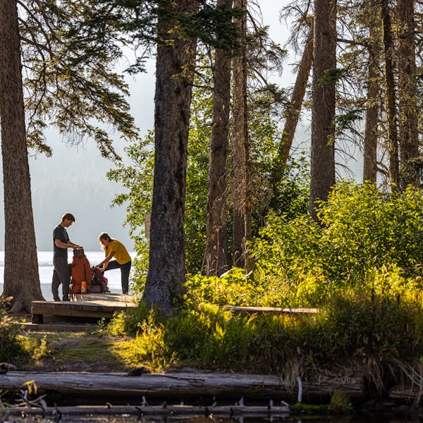 Hikers preparing for the Montana backcountry.