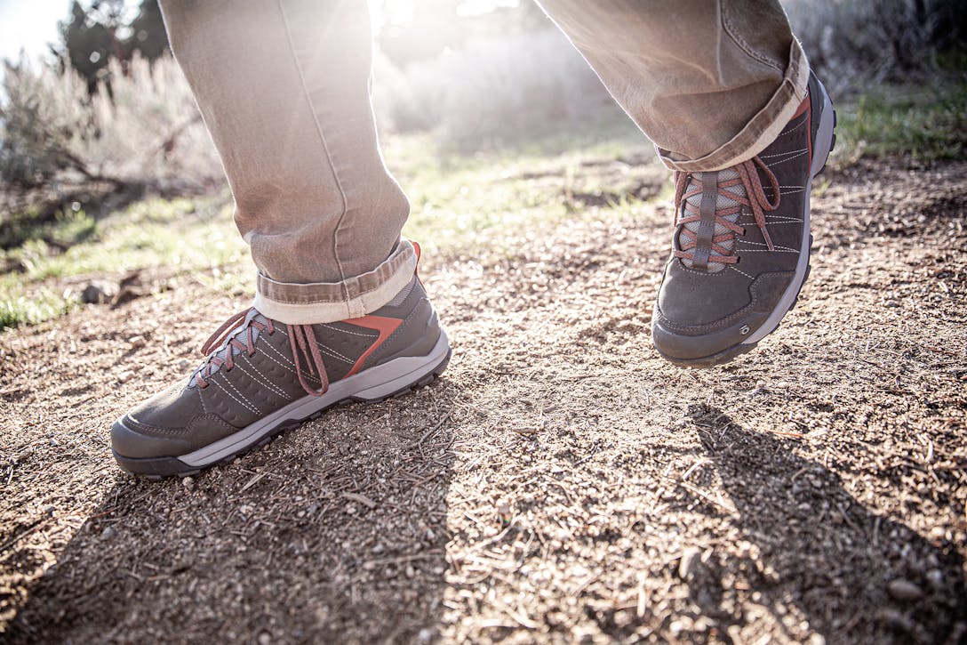 Oboz Sypes Low hiking shoe on foot in the wilderness.