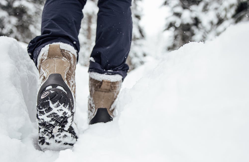 Women's Oboz Bridger 9" Insulated boot hiking through deep snow