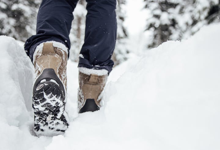 Women's Oboz Bridger 9" Insulated boot hiking through deep snow