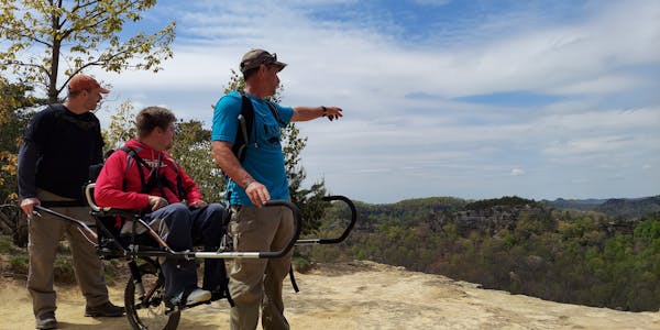Oboz Trailblazer Kevin Schwieger and his team on a hike for his nonprofit, Luke5Adventures.
