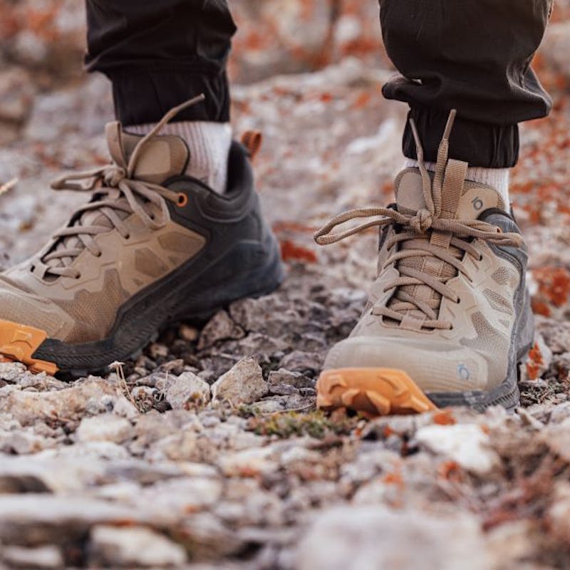 Oboz Katabatic Low hiking shoe in rocky terrain. 