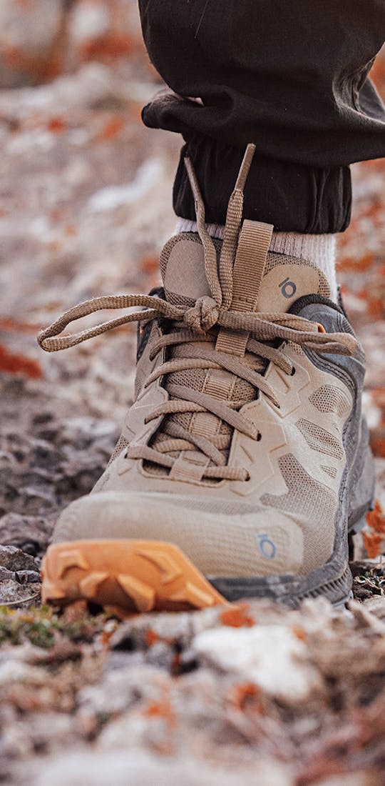 Oboz Katabatic hiking shoe in rocky terrain. 