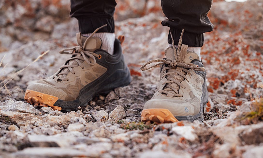 Oboz Katabatic hiking boots on a rocky trail.