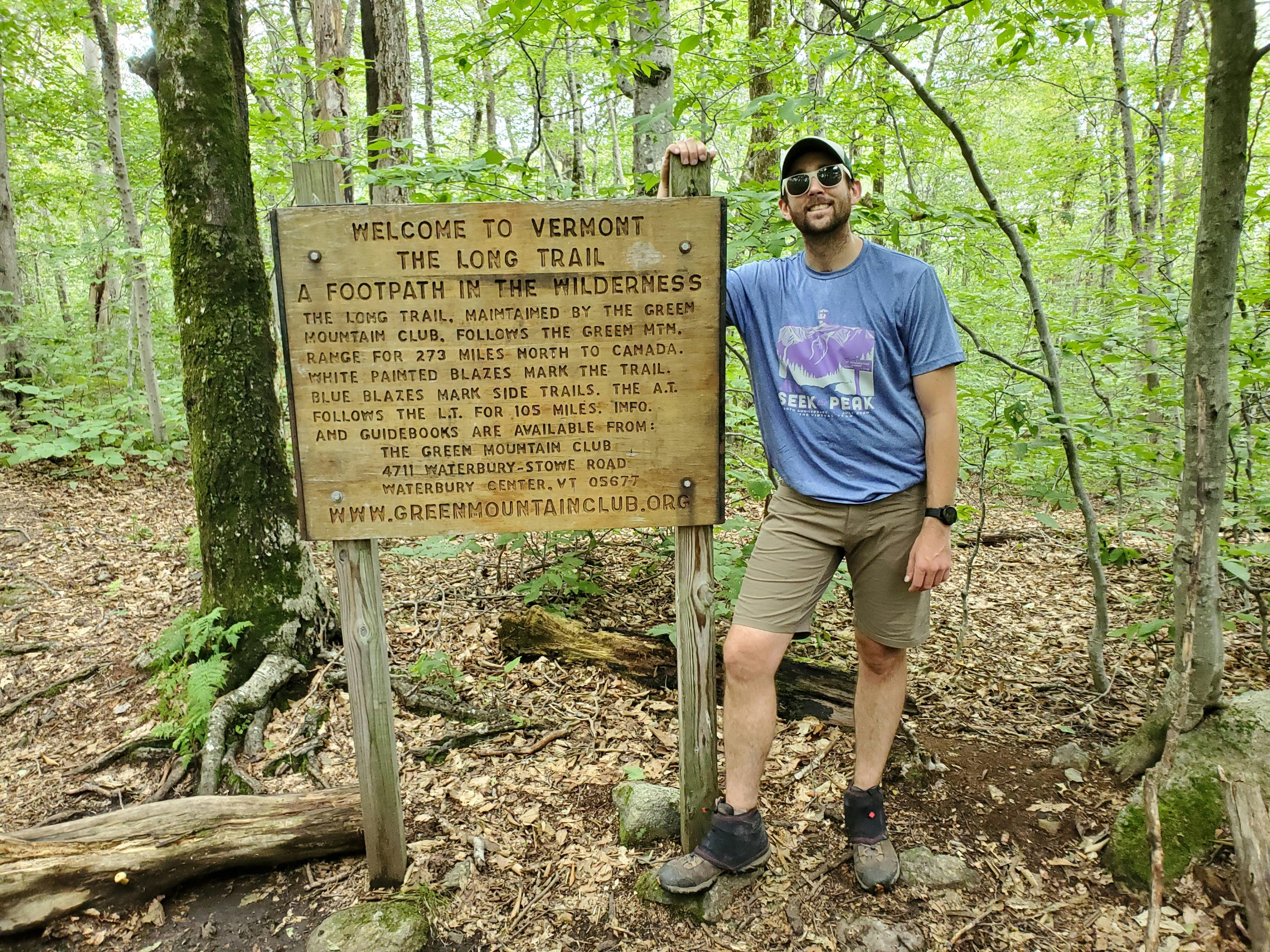 Jay Broccolo hiking in Vermont wearing Oboz Bridger Mid hiking boot.