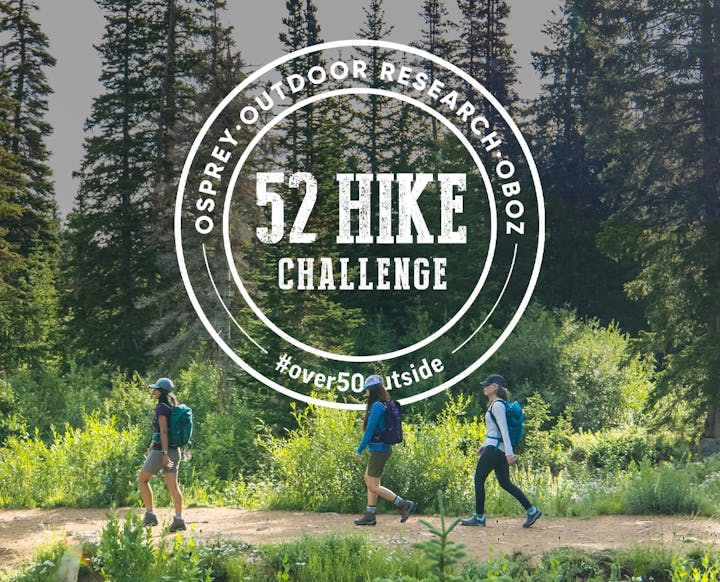 Hikers on trail with the 52 Hike Challenge logo.