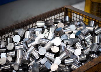 1. Un lopin découpé dans une barre d'acier