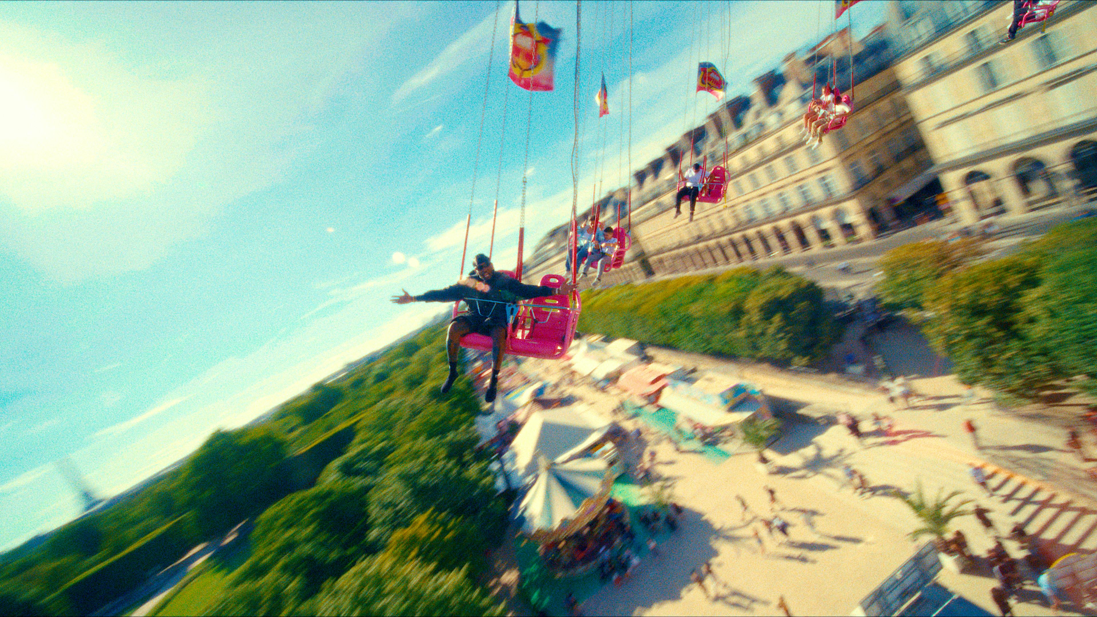 Offset on a high flying swing at a fair