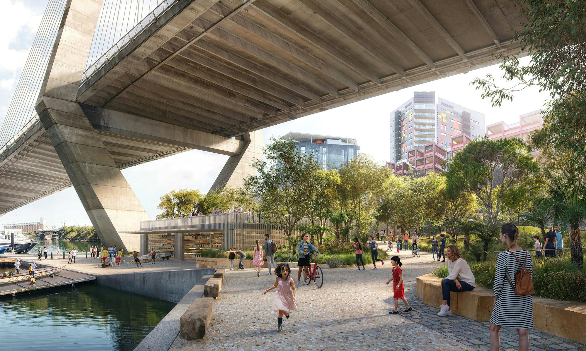 A digital render of a waterfront park filled with trees and people. The park is under a large concrete bridge, and a boat shed with ramp is visible.