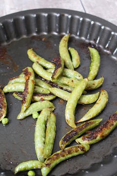 sugar snaps roasted in baking tray