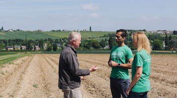 image of founders speaking with kent based asparagus grower