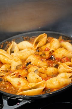aubergine ragu pasta in the cooking process 
