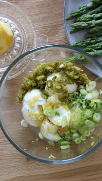 eggs and herbs in mixing bowl 