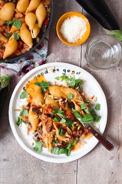 aubergine ragu pasta served with grated parmesan/vegan parmesan and toasted pine nuts. 