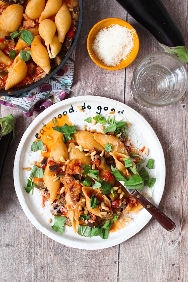 aubergine ragu pasta served with grated parmesan/vegan parmesan and toasted pine nuts.