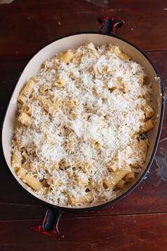 cheese added on top of the pasta