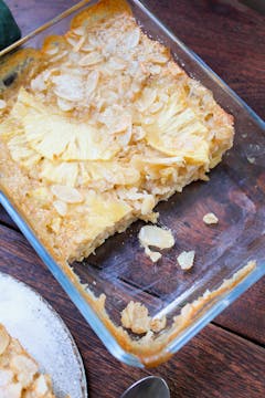 coconut and pineapple baked oats in a glass baking dish
