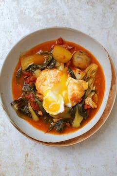 served pak choi bouillabaisse