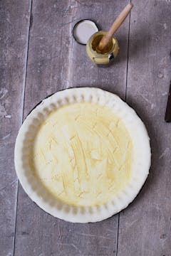 puff pastry in a baking tray with dijon mustard