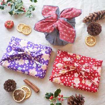 Christmas presents wrapped in cloth 
