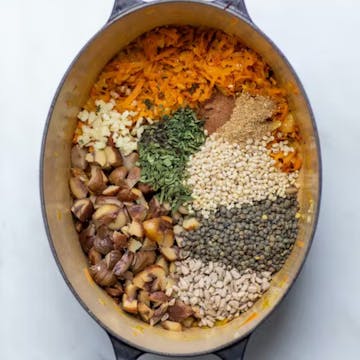 a pan filled with ingredients for a nut roast