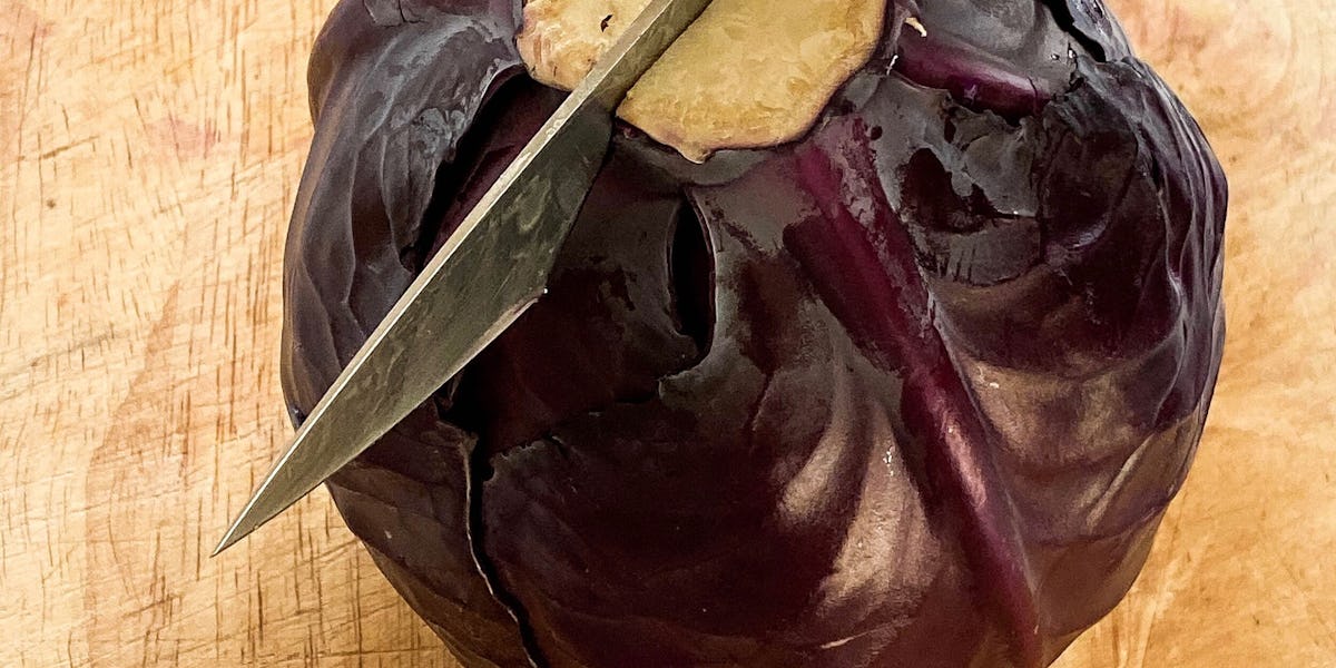 cabbage with knife on the top