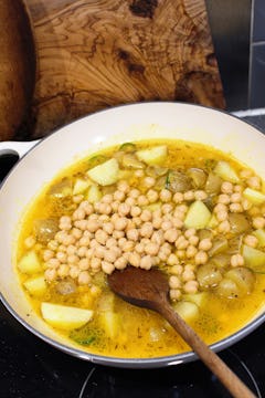 chickpeas and spices in frying pan 