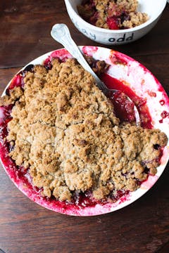 cooked crumble with a spoon inside 