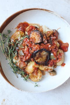 served aubergine ratatouille and roasted potatoes.