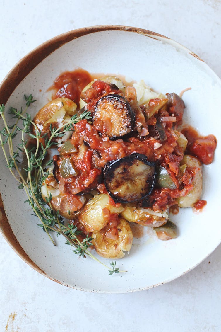 served aubergine ratatouille and roasted potatoes.