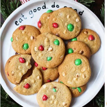 white chocolate chip cookies on a white plate