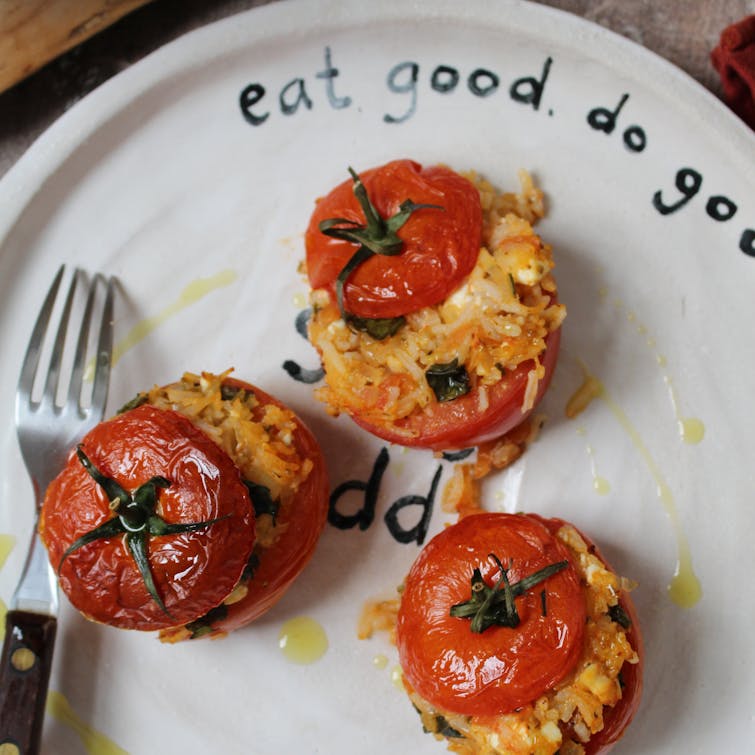 Plate with three stuffed tomatoes