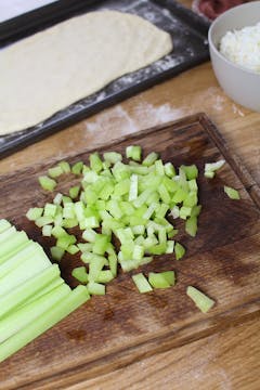 celery on chopping board 