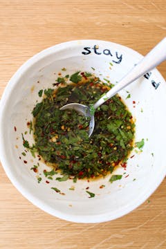Vietnamese-inspired salad dressing in a whit bowl