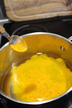 turmeric water in saucepan 