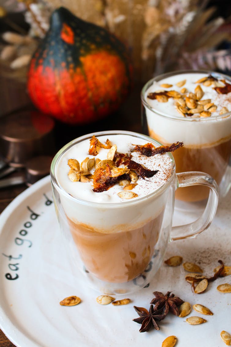 pumpkin spice latte in glass mug