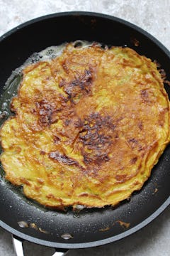 cooked omelette in a frying pan