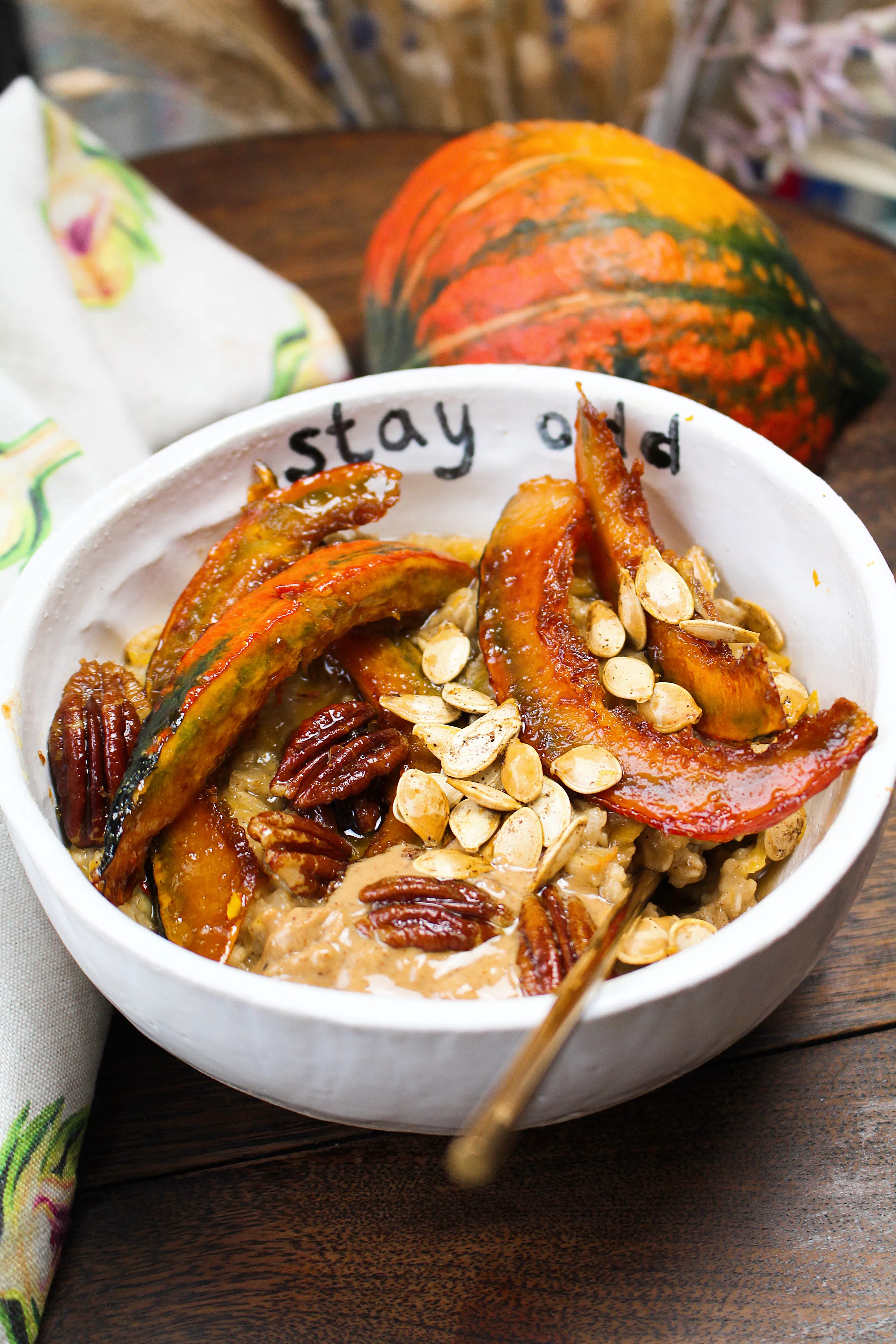 Spiced pumpkin porridge with cinnamon pumpkin seeds