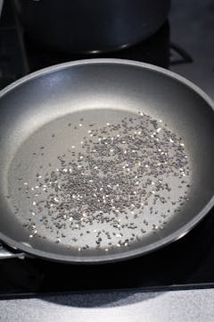 small frying pan with sesame seeds 