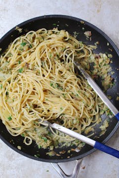 al dente pasta in a pan with fennel sauce
