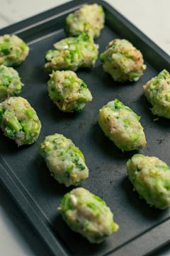 croquettes formed and put in to a baking tray