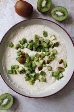 pancake batter with chopped kiwis