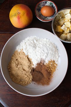 flour, sugar and spices in a white bowl