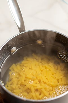 pasta cooking in a big pan