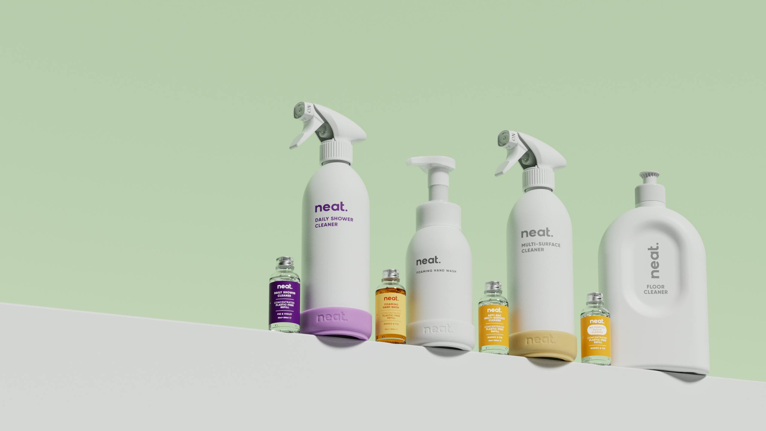 Bottles of Neat refill cleaning supplies