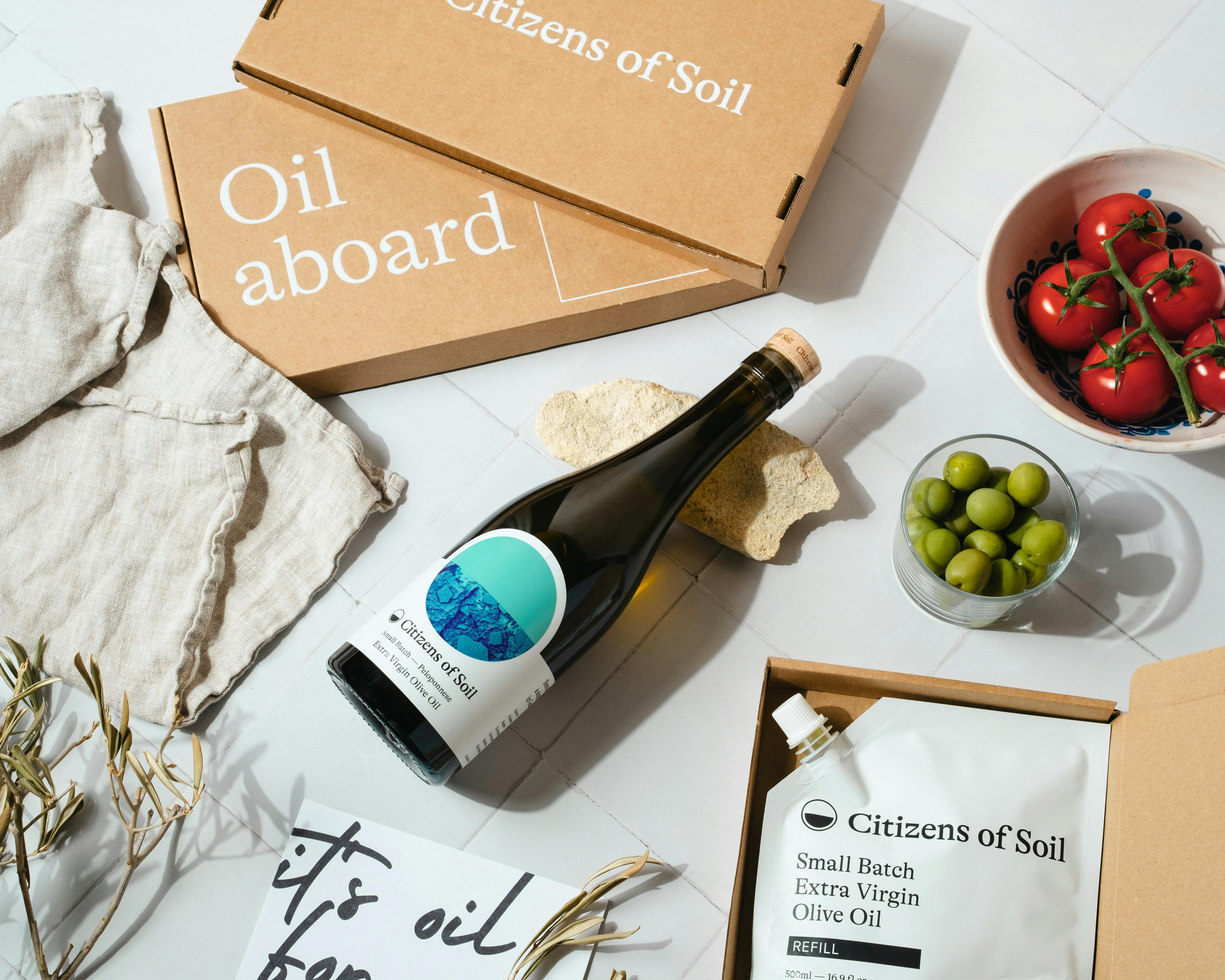Citizens of Soil olive oil bottle on a white table