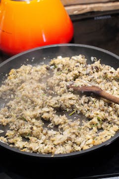 aubergine nut roats mixture in a frying pan