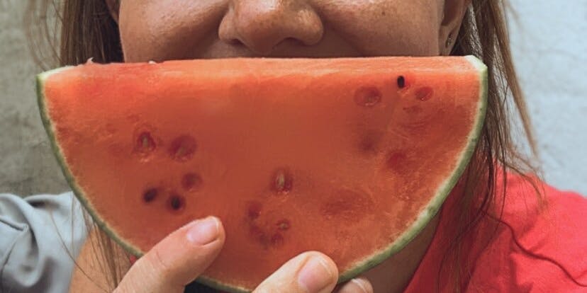 Oddbox customer with slice of watermelon